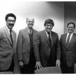 With his administrative team in 1984: (from left) Paul Burgett, Jon Engberg, RF, John Santuccio.