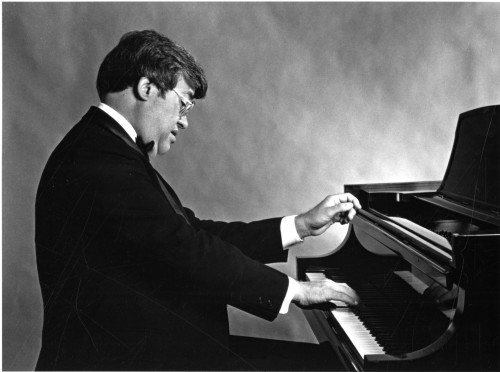 Formal portrait at piano