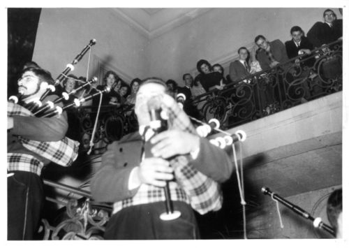 4 ESPA 5x7 3-18 Members of the Eastman Philharmonia look over the railing at a bagpipers’ band that greeted them with music at a banquet in Rennes, France, December 6th, 1961