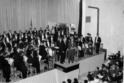 5 ESPA 5x7 3-19-A At the concert in Luxembourg, Dr. Hanson and the Eastman Philharmonia members are congratulated by one of the local dignitaries (yetunidentified).