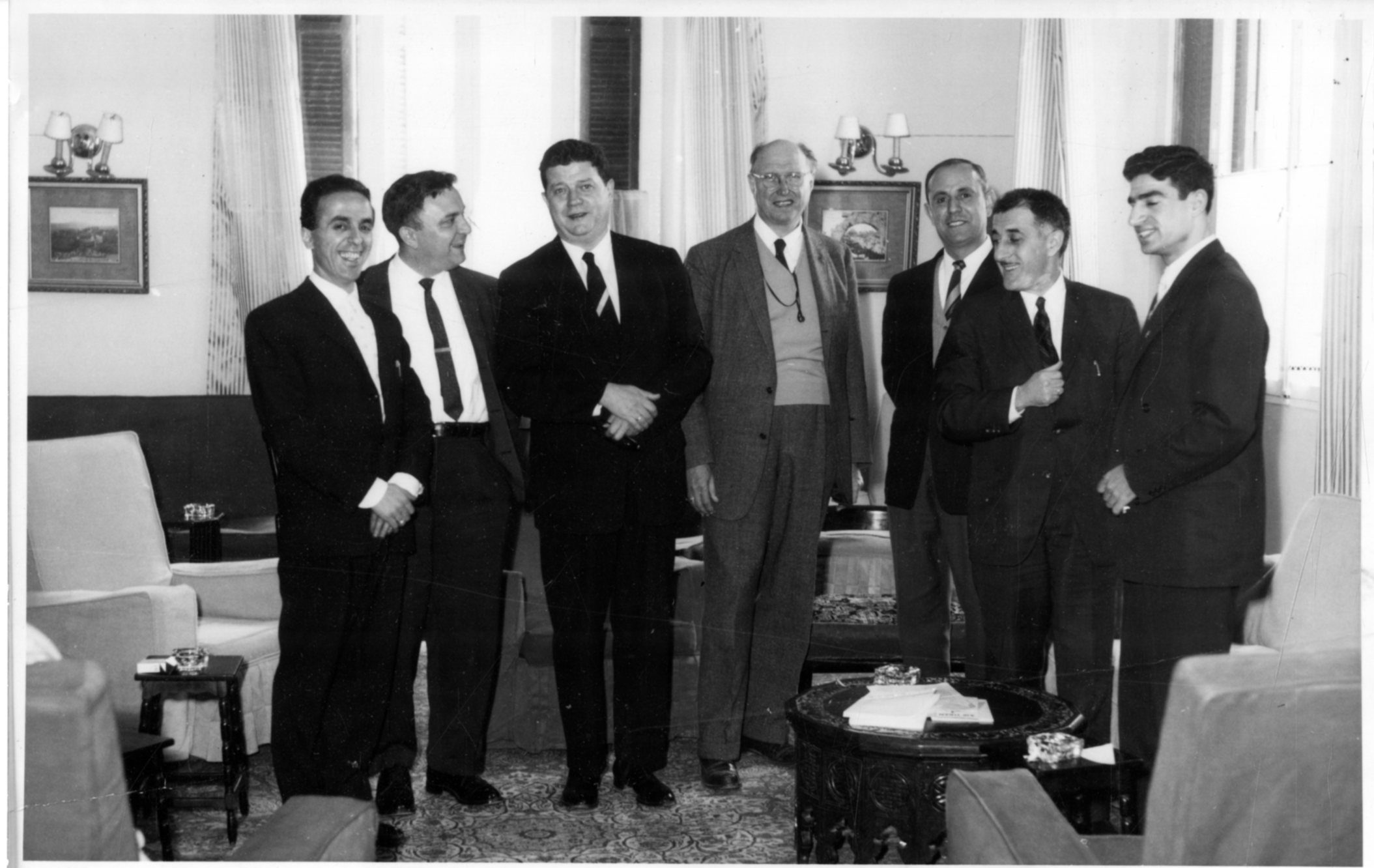 The Eastman String Quartet meeting with local dignitaries in an unidentified location during their March-May, 1960 tour. John Celentano Collection, Sibley Music Library.