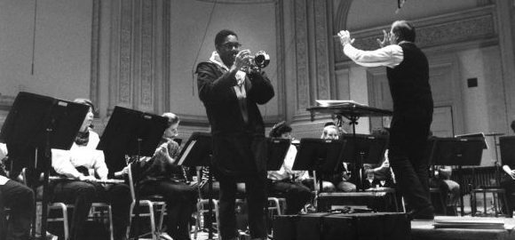 The Eastman School Photo Archive contains several thousand photographs documenting the school’s rich history. Among the collection is this photograph of Wynton Marsalis rehearsing with Donald Hunsberger and the Eastman Wind Ensemble. [ESPA, 8x10 series, 18/33]