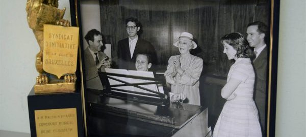 The Malcolm Frager Collection documents the pianist’s extensive and prestigious international career. Some memorabilia, such as this trophy and photograph from the 1960 Queen Elisabeth of Belgium Competition, are included among Frager’s other personal papers (e.g., programs, publicity, correspondence) and library. [Trophy from Malcolm Frager Collection (2013 Gift), Box 23/1; photograph from Malcolm Frager Collection (1992 Gift), Box 58/5]