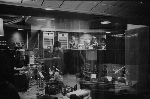 An interesting shot capturing the scene inside the control room while the Eastman Jazz Ensemble members in the adjoining room are reflected in the control room’s windows. Eastman Jazz Ensemble recording session for the motion film Bonheur d’occasion on February 27th, 1983. Louis Ouzer Archive