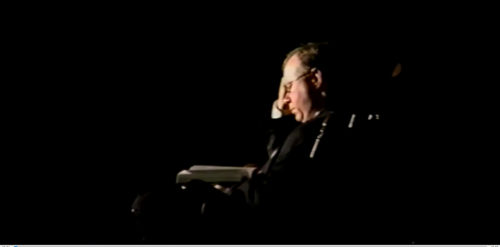 Part I at 00-30 reading in rocking chair