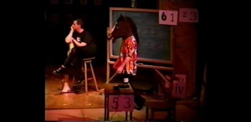 Part I at 30-30 performer returning wearing animal head