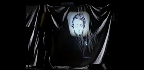 Part I at 36-58 slide of Thoreau’s likeness projected onto sheet (this a defined Solo in itself)