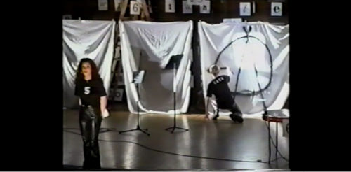 Part I at 42-55 Finally, on same sheet where Thoreau’s likeness had been projected, one performer drawing the A anarchy symbol