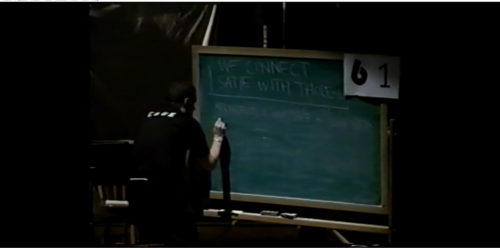 Part II at 03-18 another Solo at the chalkboard; the night’s theme/mantra explicitly written out