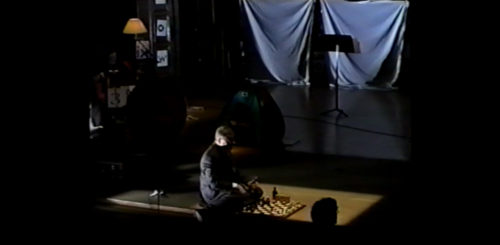 Part II at 34-20 performer delivering Solo in which he plays both sides of a game by himself, in this instance making use of the time clock