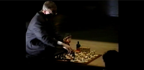 Part II at 35-55 super-imposition: playing both sides of a game while sipping from a French cognac glass