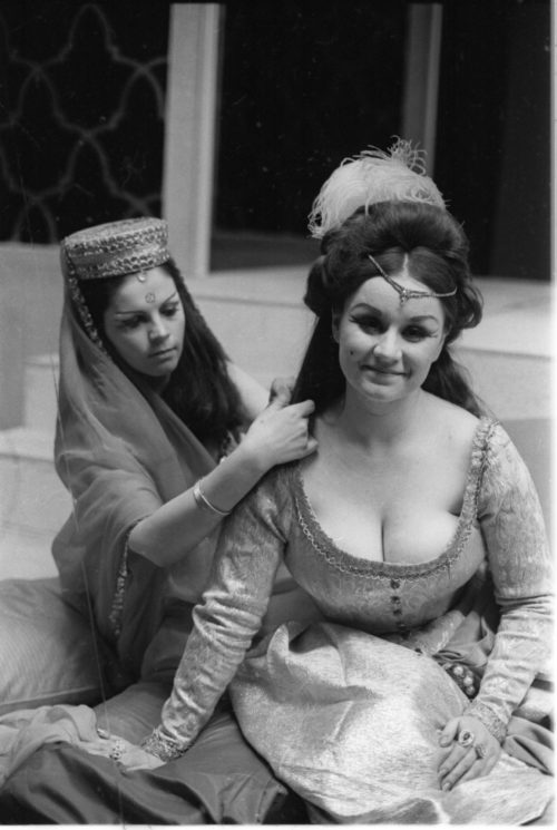 Members of the cast in repose during dress rehearsal.