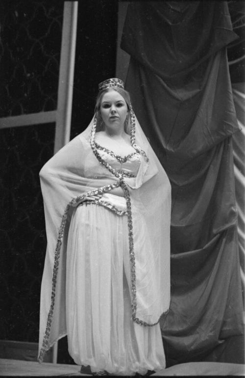 Members of the cast in repose during dress rehearsal.