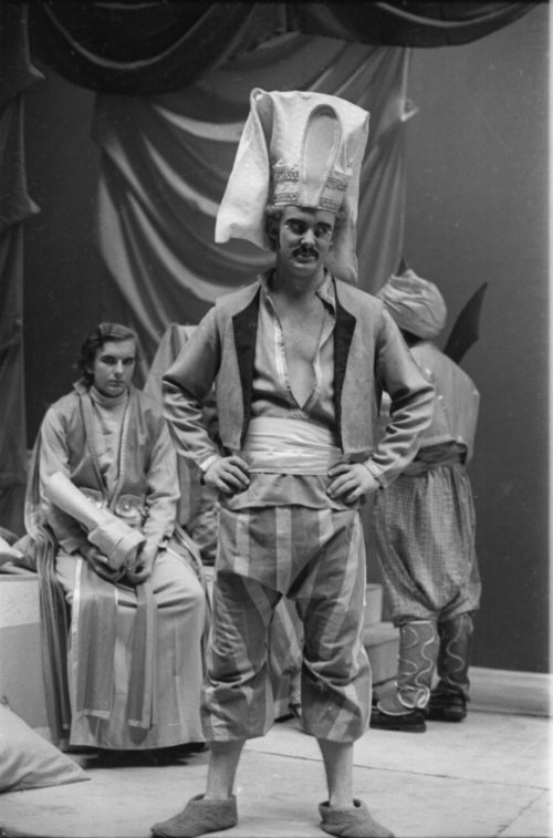 Members of the cast in repose during dress rehearsal.