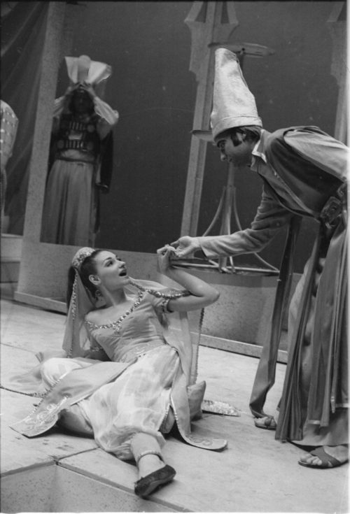 Members of the cast in repose during dress rehearsal.