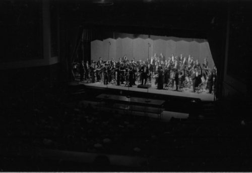 R1258-5 The Eastman Philharmonia and conductor Walter Hendl acknowledging applause in Strong Auditorium.
