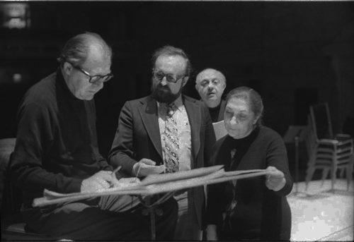 R1393-24 Conductor Walter Hendl, composer Krystof Penderecki, and soloist Felicja Blumental conferring over the score in the Eastman Theater. Ms. Blumental’s husband Markus Mizne is seen in the background in several of these shots.