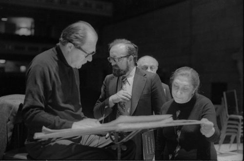 R1393-26 Conductor Walter Hendl, composer Krystof Penderecki, and soloist Felicja Blumental conferring over the score in the Eastman Theater. Ms. Blumental’s husband Markus Mizne is seen in the background in several of these shots.