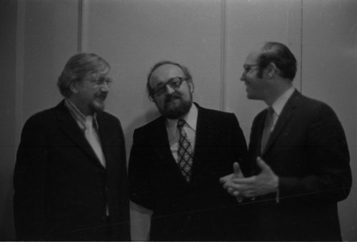 R1400-4 At the post-concert reception, composer Penderecki engages in conversation with ESM Professors Warren Benson (left) and Samuel Adler (right).