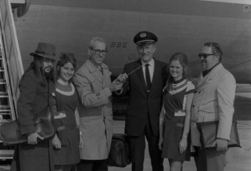 Photographer Louis Ouzer accompanied the Eastman musicians on their three-city tour. These shots capture ensemble members and their directors in candid moments during travel.