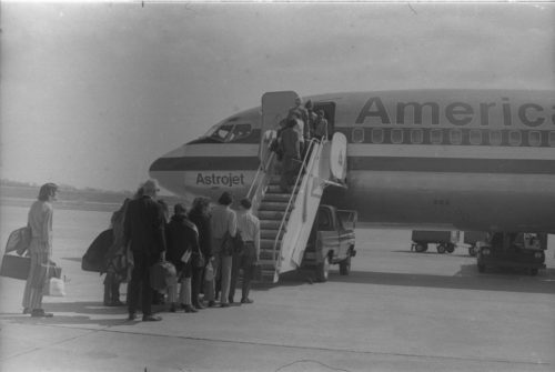 Photographer Louis Ouzer accompanied the Eastman musicians on their three-city tour. These shots capture ensemble members and their directors in candid moments during travel.