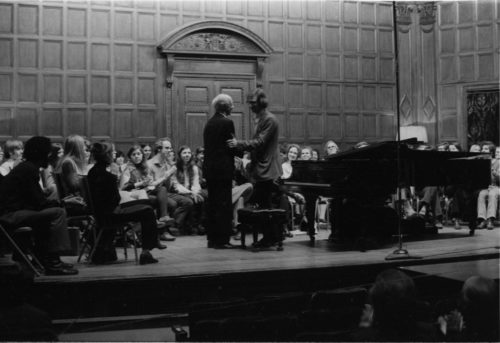 Guest artist Rudolf Serkin in master class with Eastman School students on the stage of Kilbourn Hall.