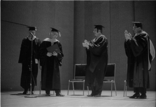 Conferral of the honorary Doctor of Music degree on guest artist Rudolf Serkin. UR President W. Allen Wallis presides; Director Walter Hendl presents the degree and reads the citation; and Assistant Director Daniel R. Patrylak hoods the newly designated Dr. Serkin.