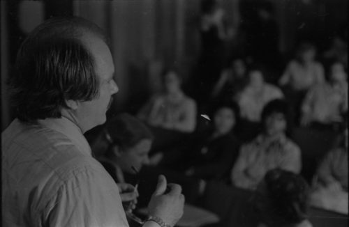 R2889-16 John Perry addressing listeners in Howard Hanson Hall.