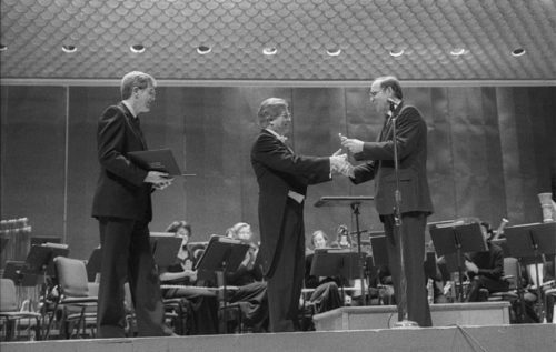 R4037-4 Dr. Donald Hunsberger, conductor of the Eastman Wind Ensemble since 1964, is presented with the National Band Association Academy of Wind and Percussive Arts Society Award by Edward Lisk, President of the NBA.