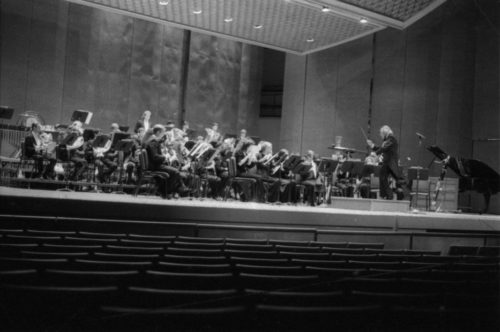 R4041-18 The Eastman Wind Ensemble on-stage in the Eastman Theater: first under Frederick Fennell, and then under Donald Hunsberger, with tuba soloist Toru Miura.