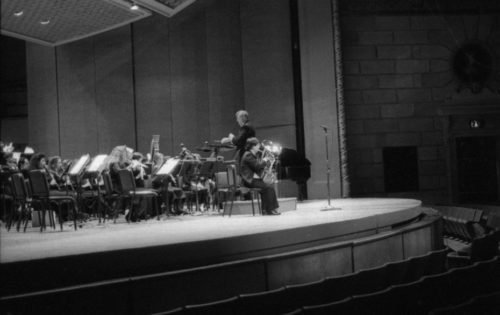 R4041-21 The Eastman Wind Ensemble on-stage in the Eastman Theater: first under Frederick Fennell, and then under Donald Hunsberger, with tuba soloist Toru Miura.