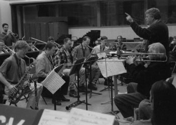 Fred Sturm conducts while Bob Brookmeyer