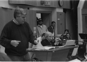 Fred Sturm conducts while Bob Brookmeyer