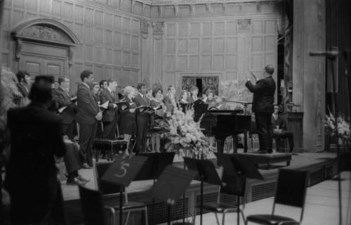 R582-12 Members of the Eastman Chorale on-stage in Kilbourn Hall, conducted by Professor Milford Fargo. In the first two shots, baritone Joseph Bias (not holding a score) is the soloist.