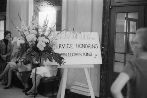 R582-9 Poster in the Main Hall (today Lowry Hall) promoting the memorial service to be held on April 9th, 1969.