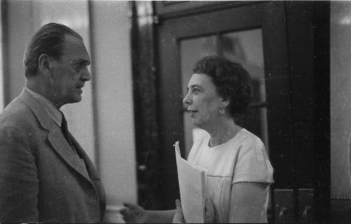 R691-16A Composer Alec Wilder and harpist Eileen Malone in conversation in the Eastman School’s Main Hall (today Lowry Hall) during the AHS 6th national conference, June, 1969.