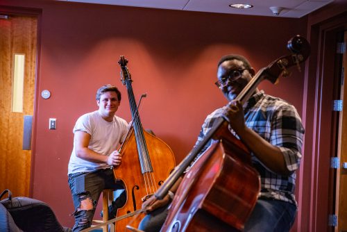 Two double bass students rehearsing Two double bass students rehearsing