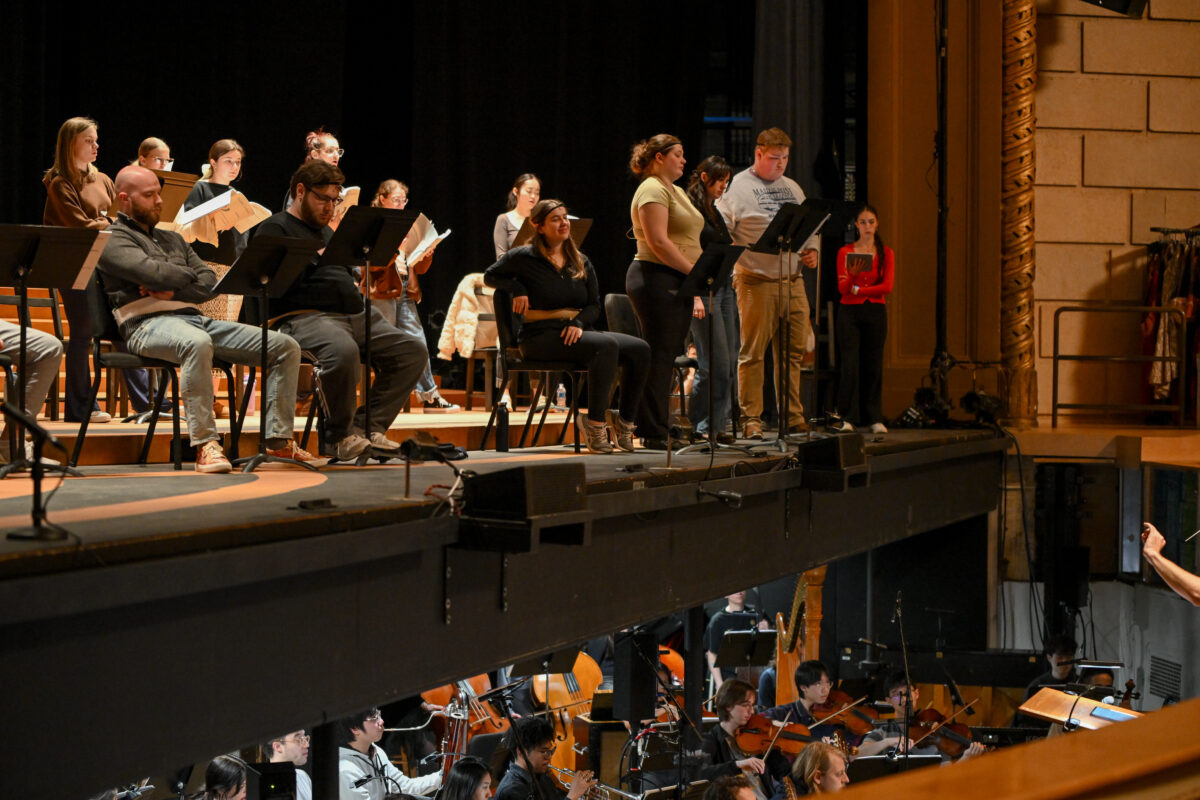 pit orchestra with the performers on stage
