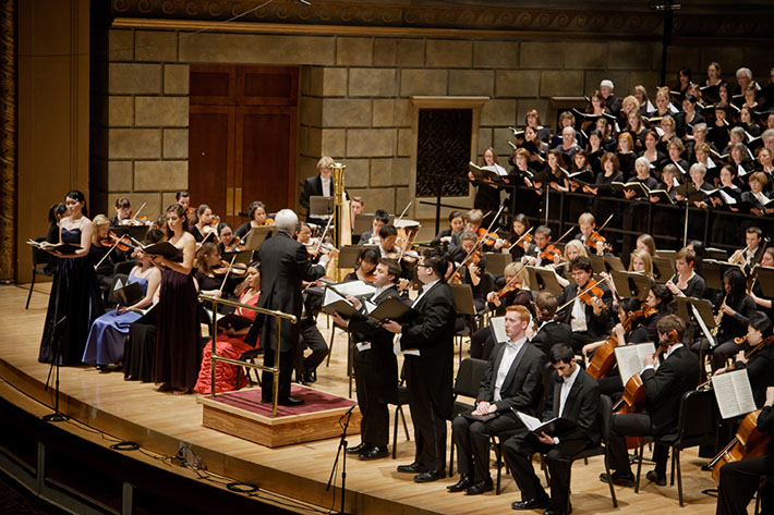 William Weinert, director of choral activities, leading the Eastman Rochester Chorus, Eastman Philharmonia, and student soloists in Schumann’s Transfiguration of Faust, November 2011.