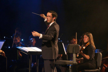 >DMA conducting student and Philadelphia Orchestra Conducting Fellow Austin Chanu