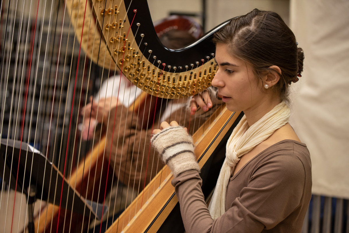Meliora Weekend harp student in rehearsal Harp student in rehersal