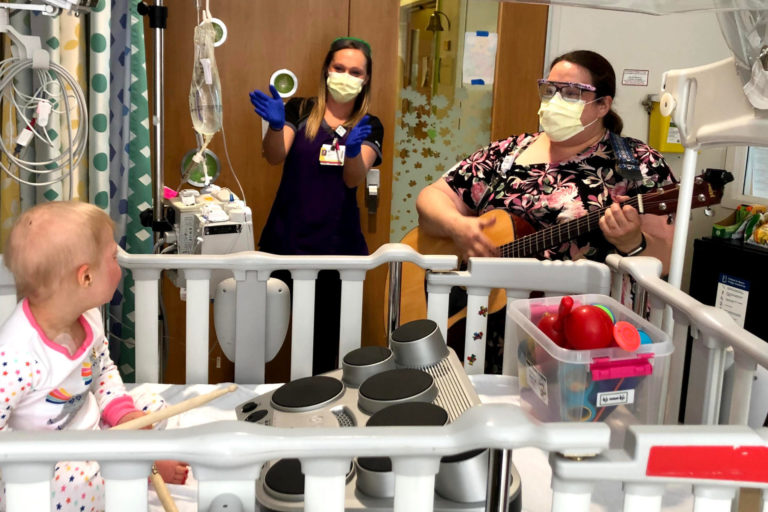 Rosemary Obi provides music therapy for the youngest hospital patients.