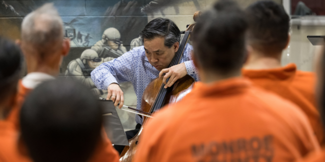 Cellist David Ying performs for Monroe County’s incarcerated population as part of Eastman School of Music's ROC City Concerts series.