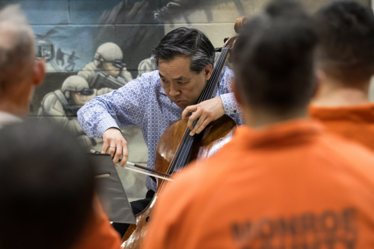 Cellist David Ying performs for Monroe County’s incarcerated population as part of Eastman School of Music's ROC City Concerts series.