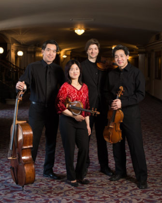 Ying Quartet, L-R: David Ying (cello), Janet Ying (violin), Robin Scott (first violin), and Phillip Ying (viola) outside Kodak Hall at Eastman Theatre