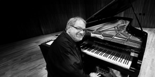 harold-danko_multicrop Harold Danko sitting at piano on stage