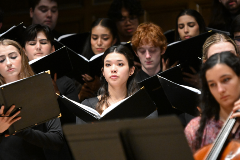 Chorus and Cellist in performance
