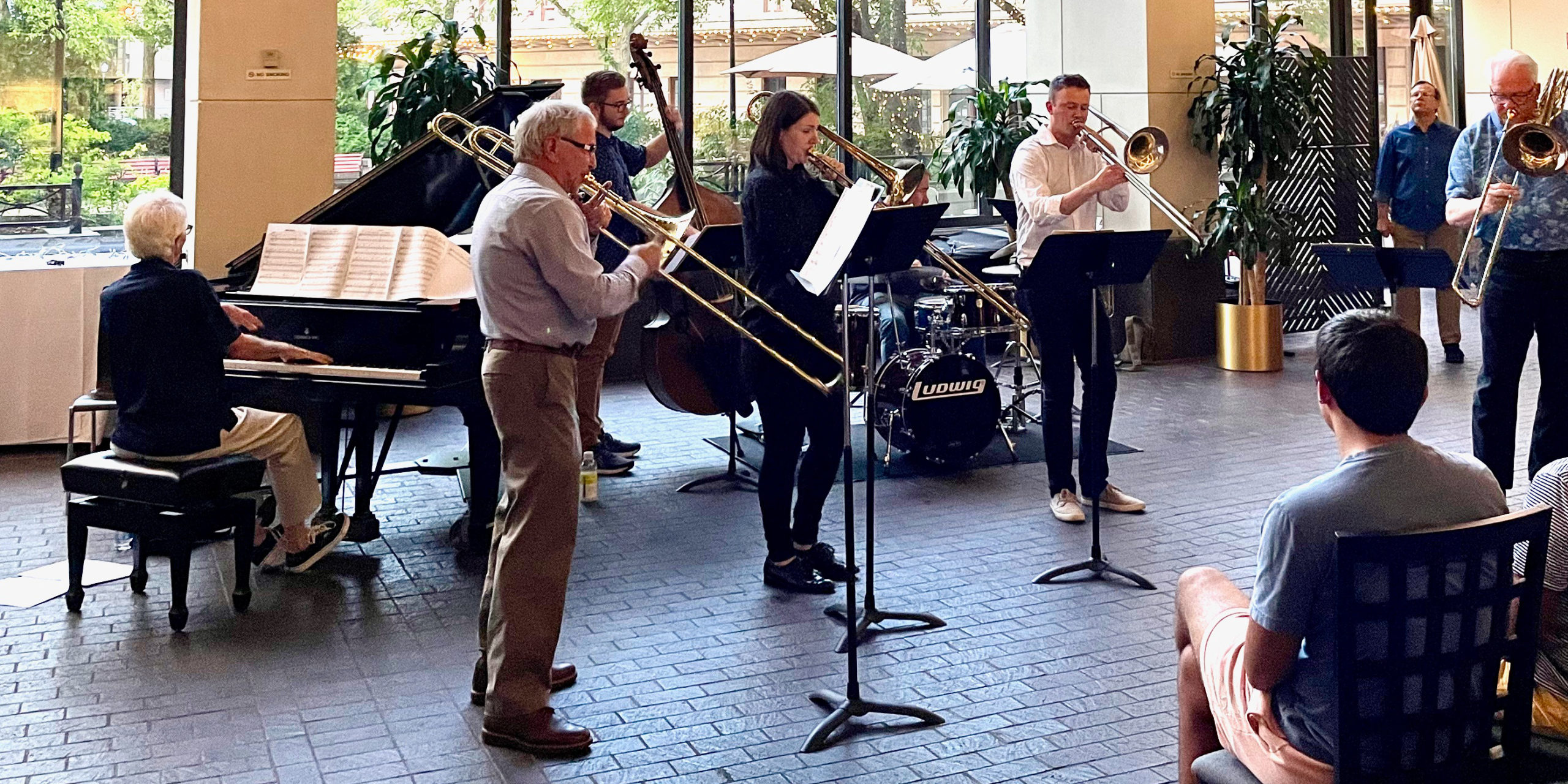 trombone players in atrium